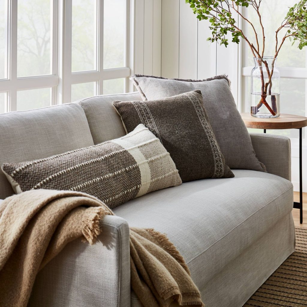 transitional decor, casual decor, wool pillow, grey couch, Studio McGee