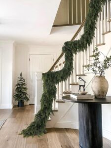 Realistic cedar Christmas garland with loose natural-looking evergreen branches