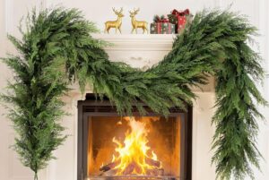 Realistic mixed evergreen Christmas garland with natural-looking branches