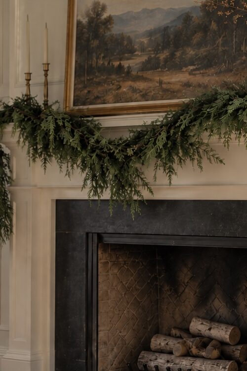 natural looking Christmas garland styled on a fireplace mantle