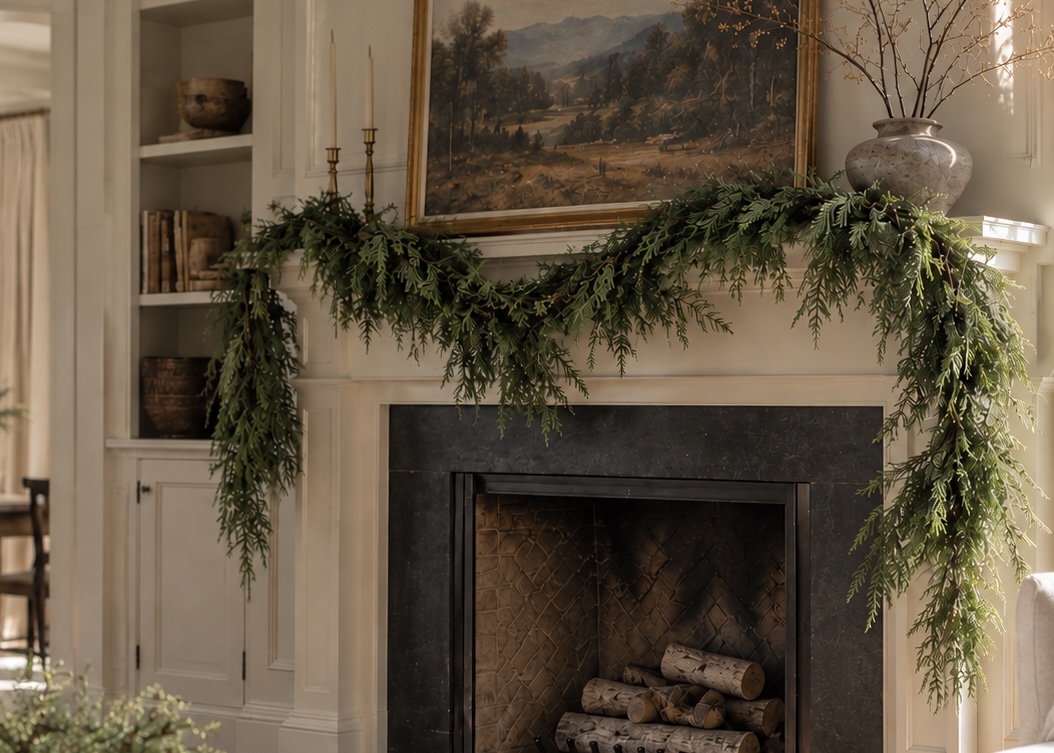 natural looking Christmas garland styled on a fireplace mantle